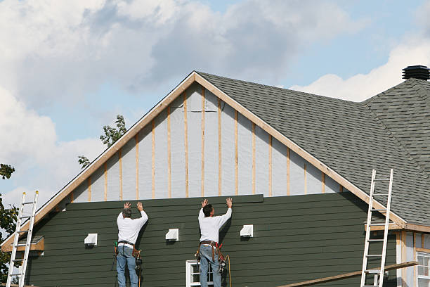 Professional Vinyl Siding technician working in New Eagle, PA